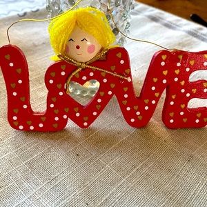 Vintage handmade wooden love ornament